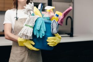 holding-bucket-of-cleaning-supplies